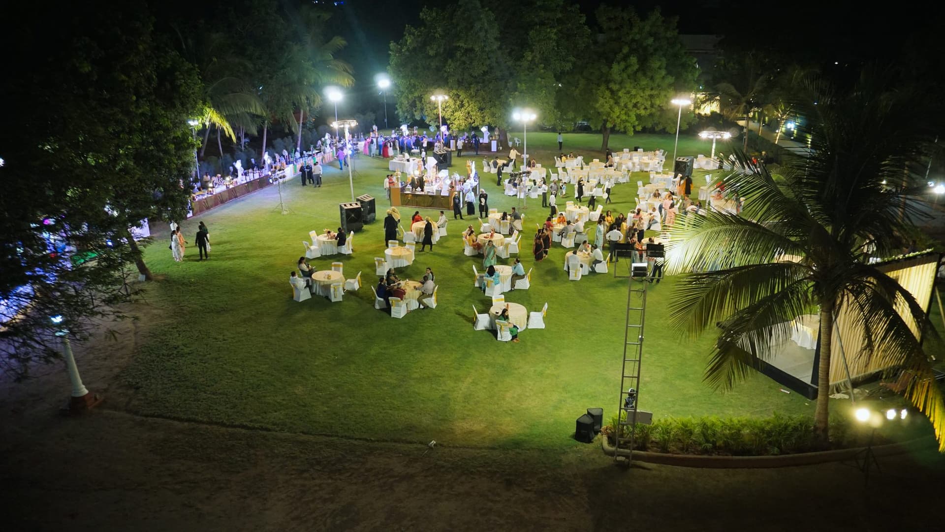 Birthday celebration seating and decor viewed from the palace terrace