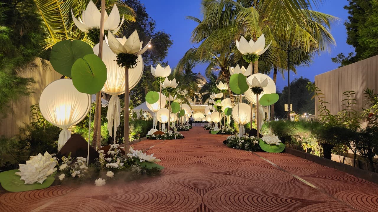 Lotus-lantern walkway leading to the reception stage at Shivmahal Palace