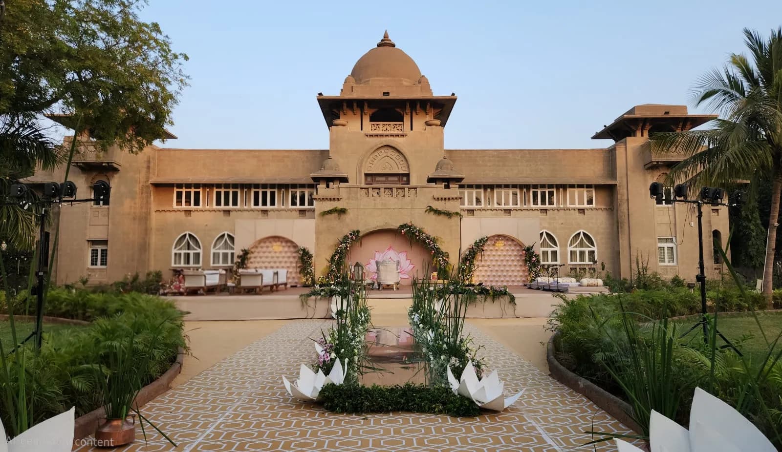 Lotus stage decor and a patterned pathway at Shivmahal Palace, Vadodara